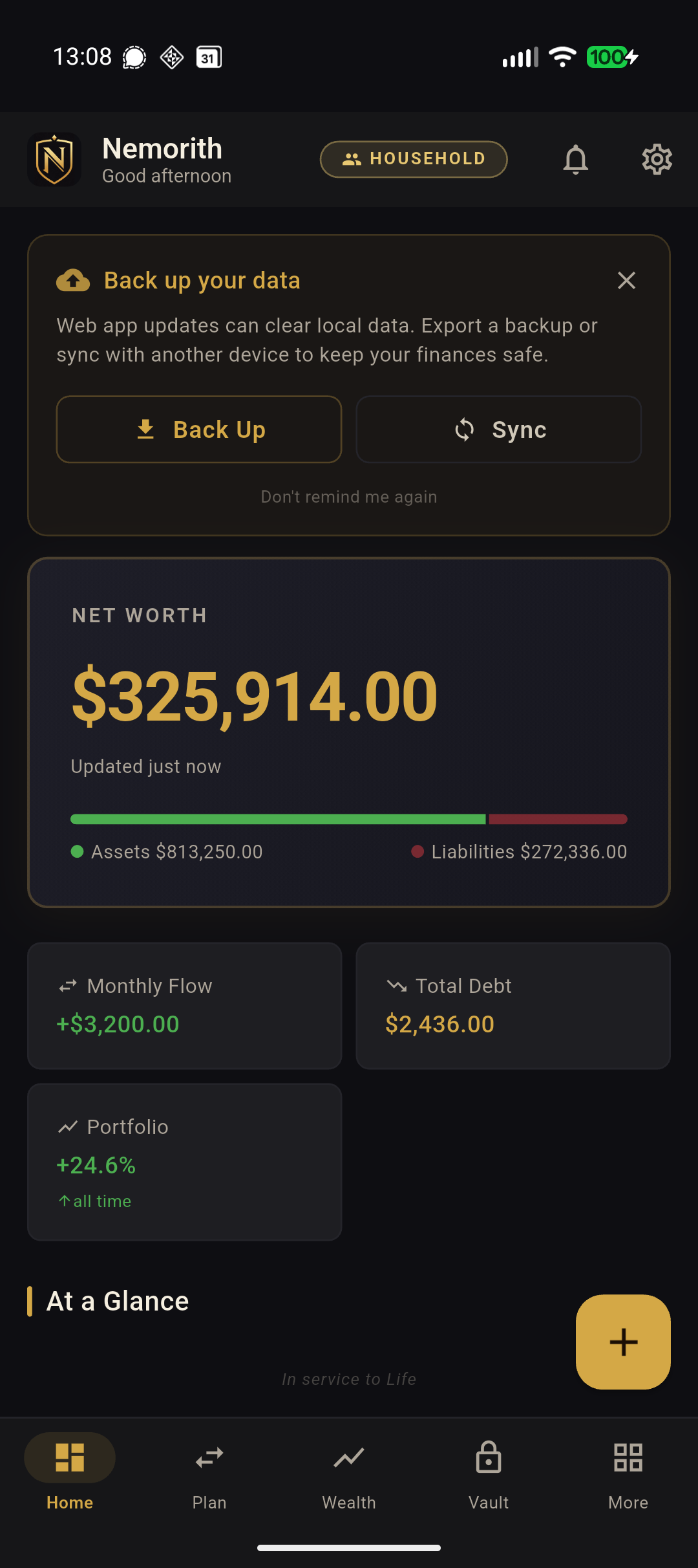 Dashboard showing net worth, monthly flow, debt, and portfolio overview